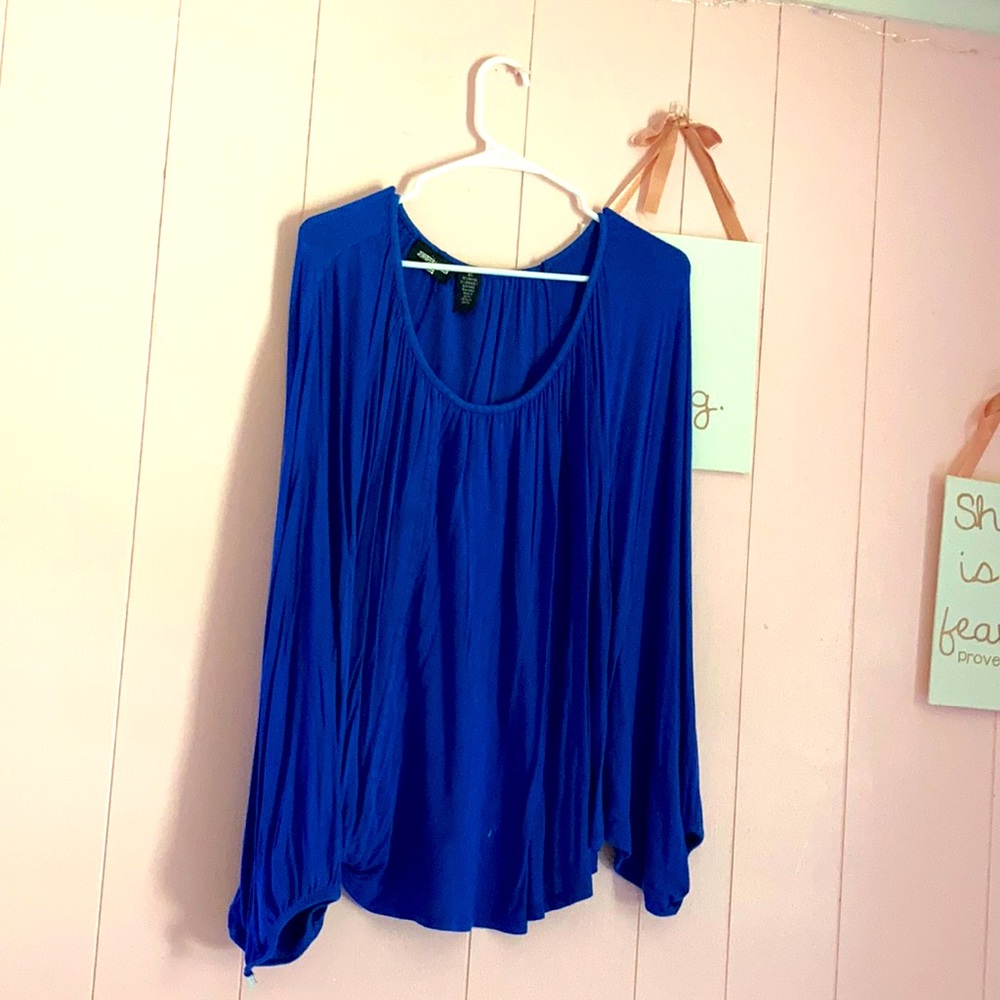 Long sleeved blue dressy shirt